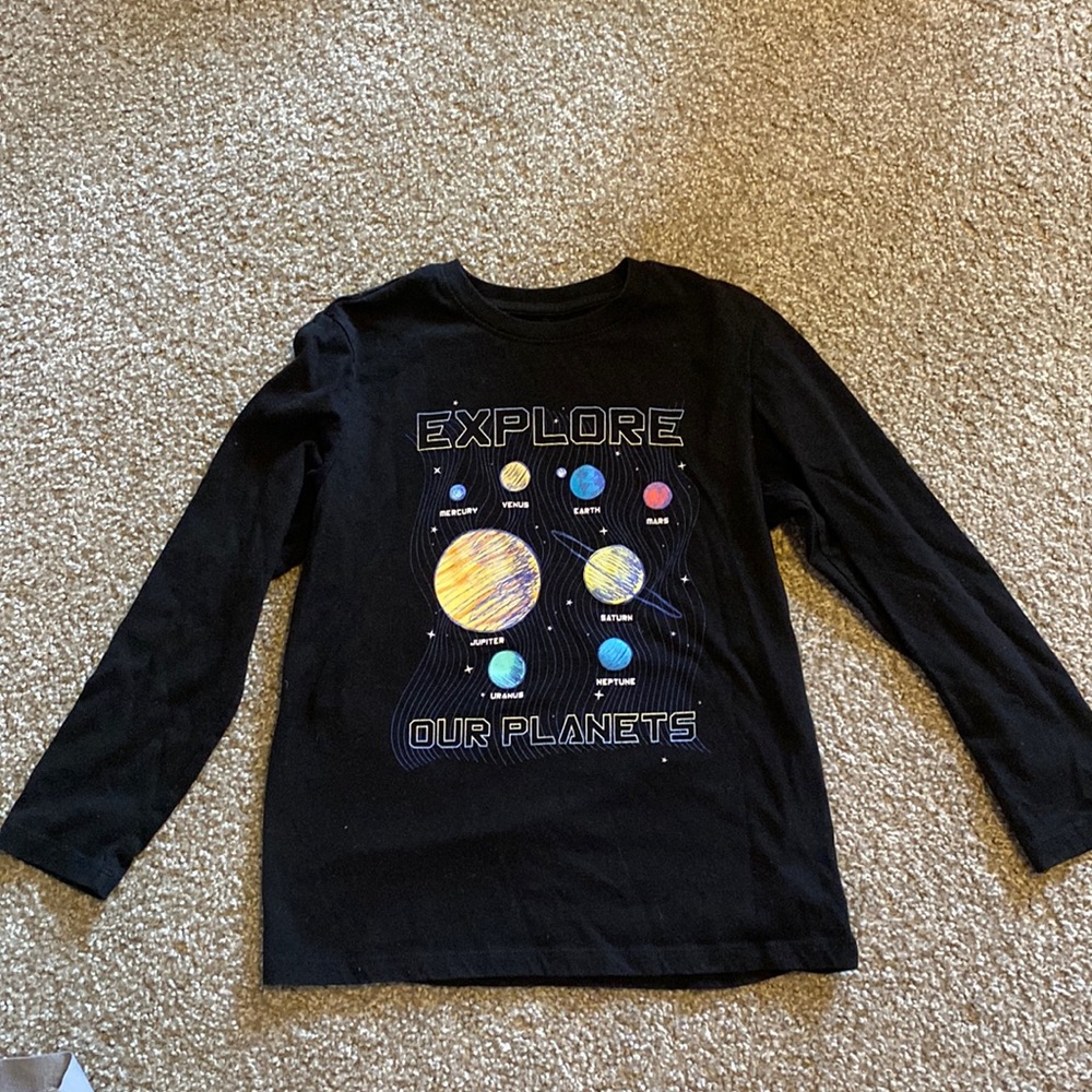 Boys size large (10/12) black long sleeved shirt with space images.